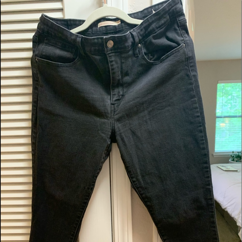 Levi’s 721 High Rise Skinny Jeans with raw hem.